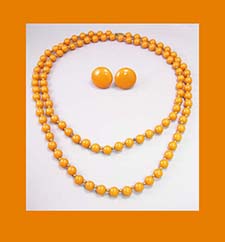Lovely Orange Bakelite Long Necklace and Earrings