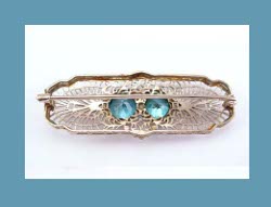 Genuine Blue Zircon White Gold Filigree Pin Back