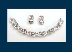 Bogoff Sapphire Rhinestone Bracelet and Earrings Signature