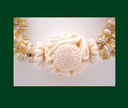 Contemporary Golden Beaded Necklace with Magnificent Center Bead Close Up