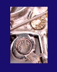 Urie Mandle Arlequin Sterling & Rhinestone Pin Signature
