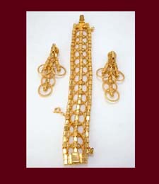 Golden Circles and Rhinestone Bracelet and Earrings Back