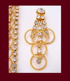 Golden Circles and Rhinestone Bracelet and Earrings Close