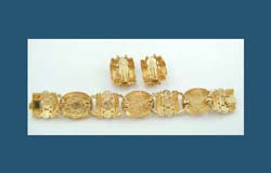 Joan Rivers Blue
                Glass Cabochon Bracelet and Earrings Back