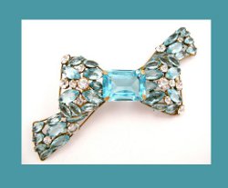 Large Vogue Sterling and Aqua Rhinestone Bow Pin Front