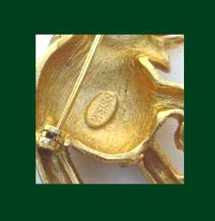Weiss Textured Gold Tone Rhinestone Elephant Pin Signature