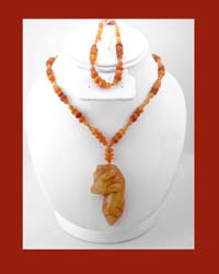 Contemporary Carved Lamb Pendant and Bracelet