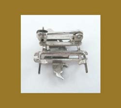 Petite Enamel and
                Sterling Musician on a Bench Pin Signature